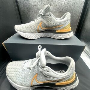 Nike Women’s Gray Sneakers with Yellow Accents